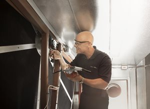 2016-7015-Tech-Cleaning-Air-Handler-Room.jpg 2016-7015-Tech-Cleaning-Air-Handler-Room.jpg